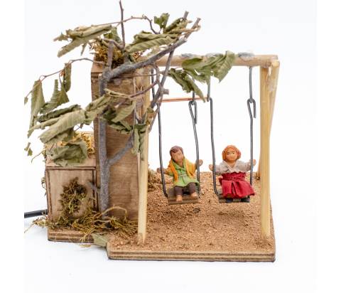 Coppia di Bambini in Altalena - mov h 10 cm